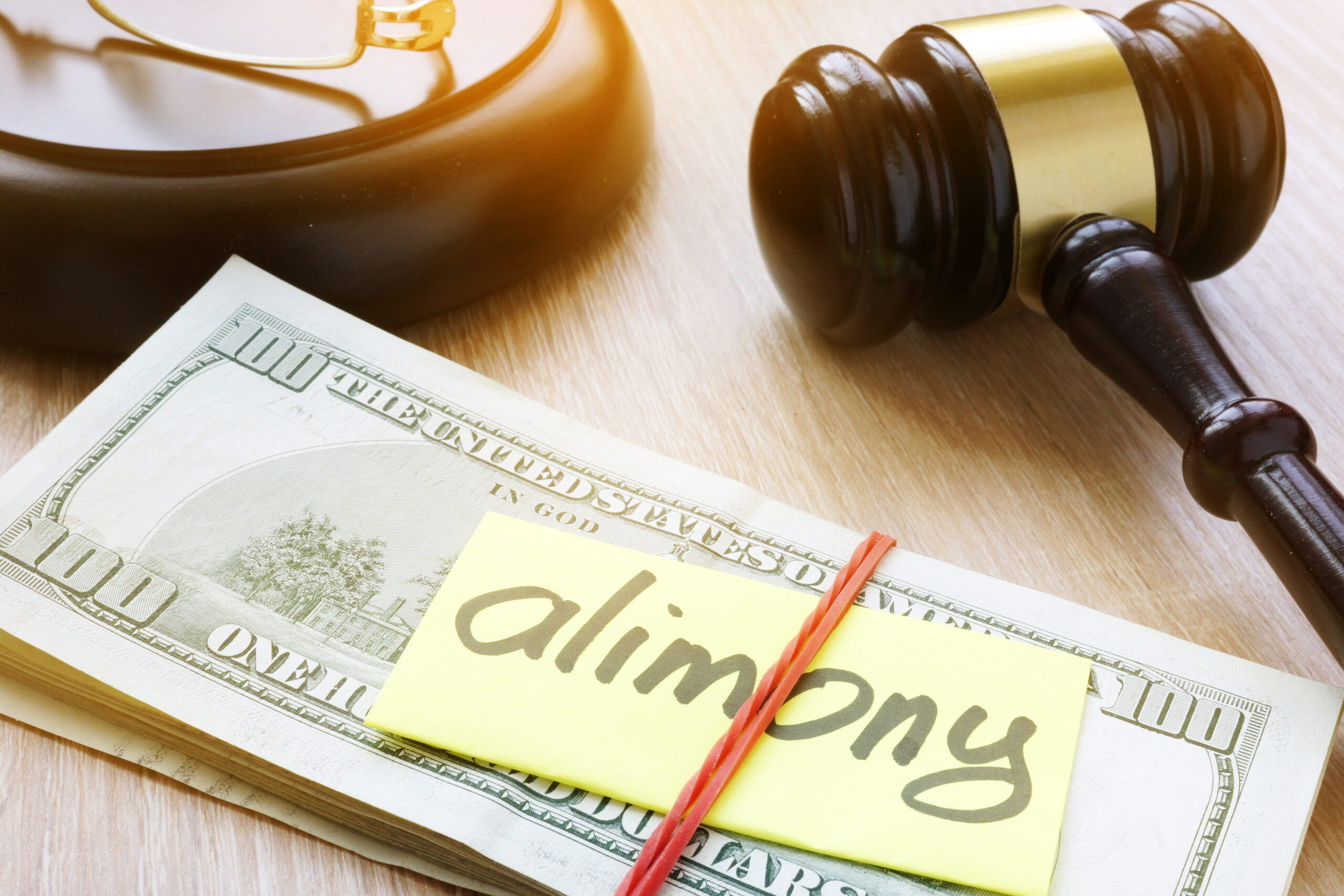 Alimony on a court desk. Divorce and separation concept Alimony and Spousal Support