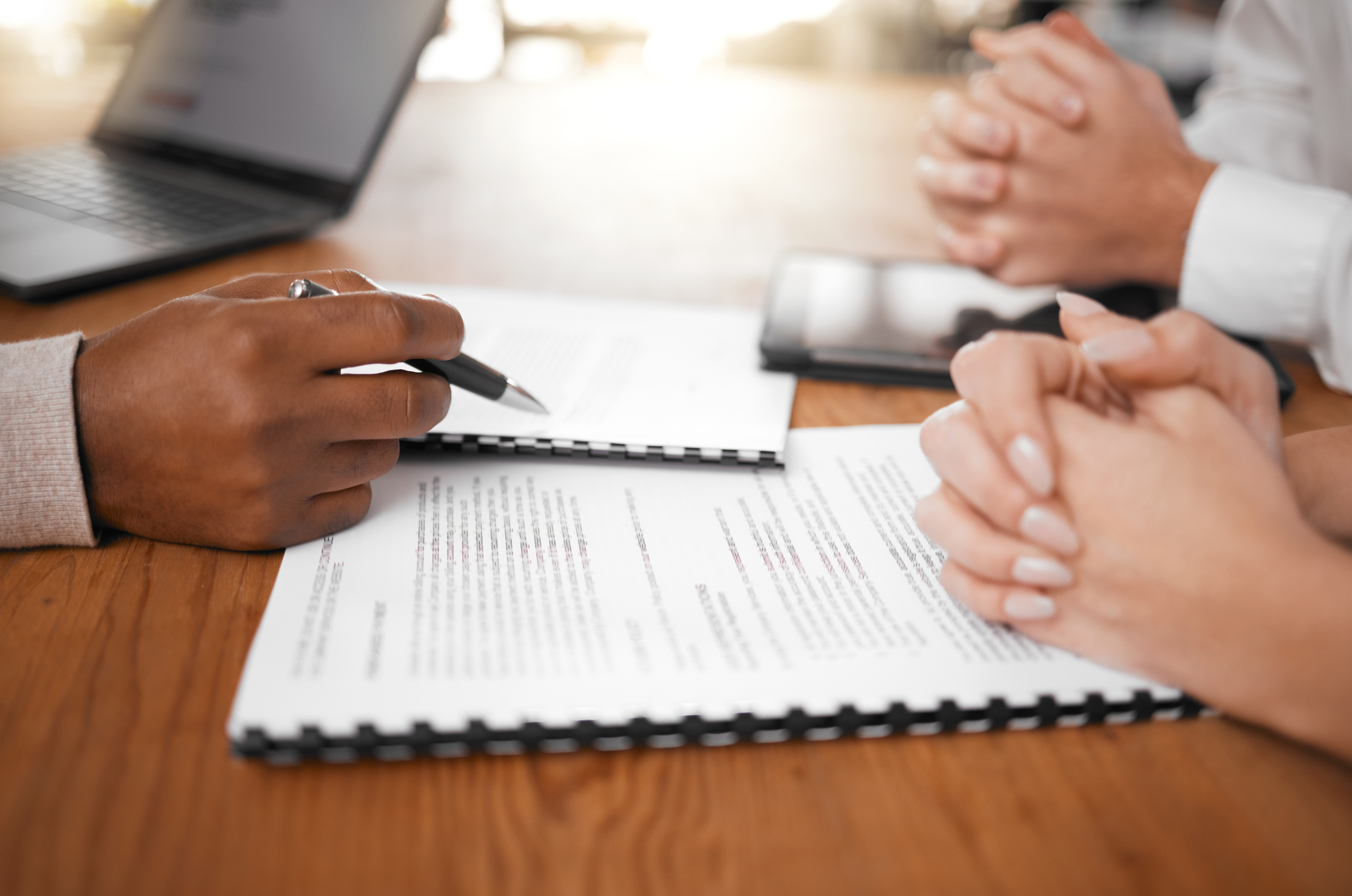 Hands, signing and couple with lawyer and contract for marrriage, mortgage or insurance. Legal, investment and a man and a woman with an advisor and paperwork for an agreement, service and compliance Questions to Ask Your Attorney About Financial Matters in Divorce